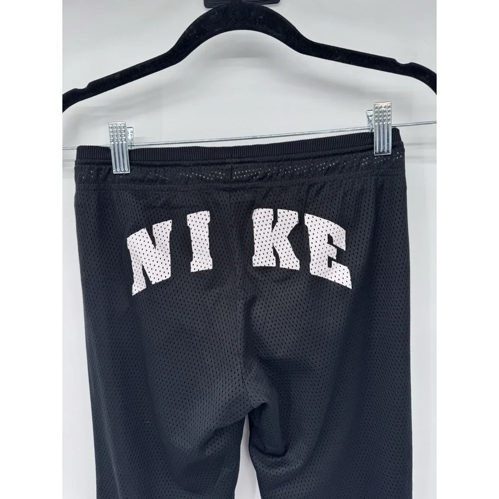 Nike girl M mesh lined snap side back logo flare pants athletic Y2K 90s preppy